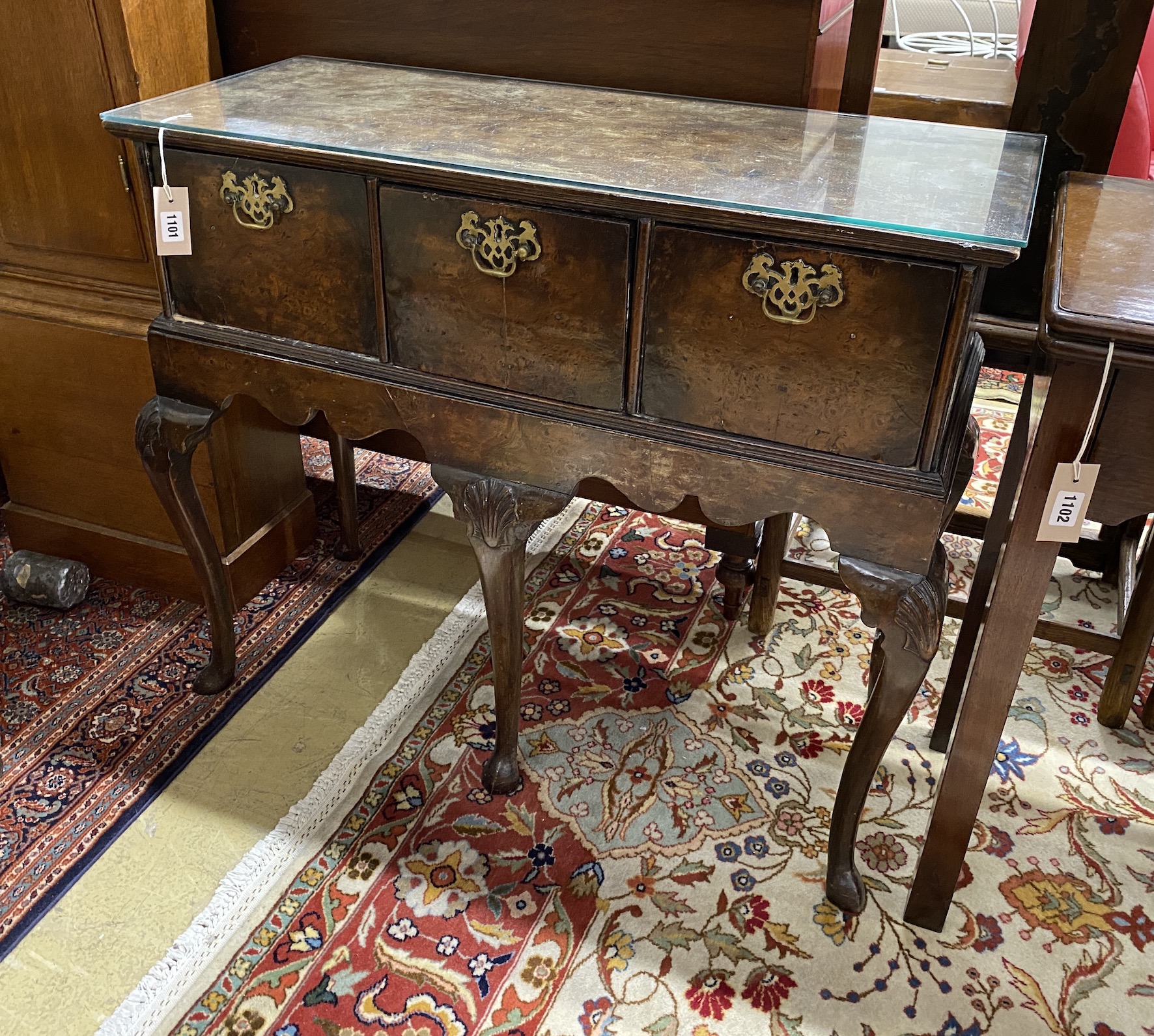 A Queen Anne style walnut three drawer side table, possibly an adapted stand, width 91cm, depth 38cm, height 77cm